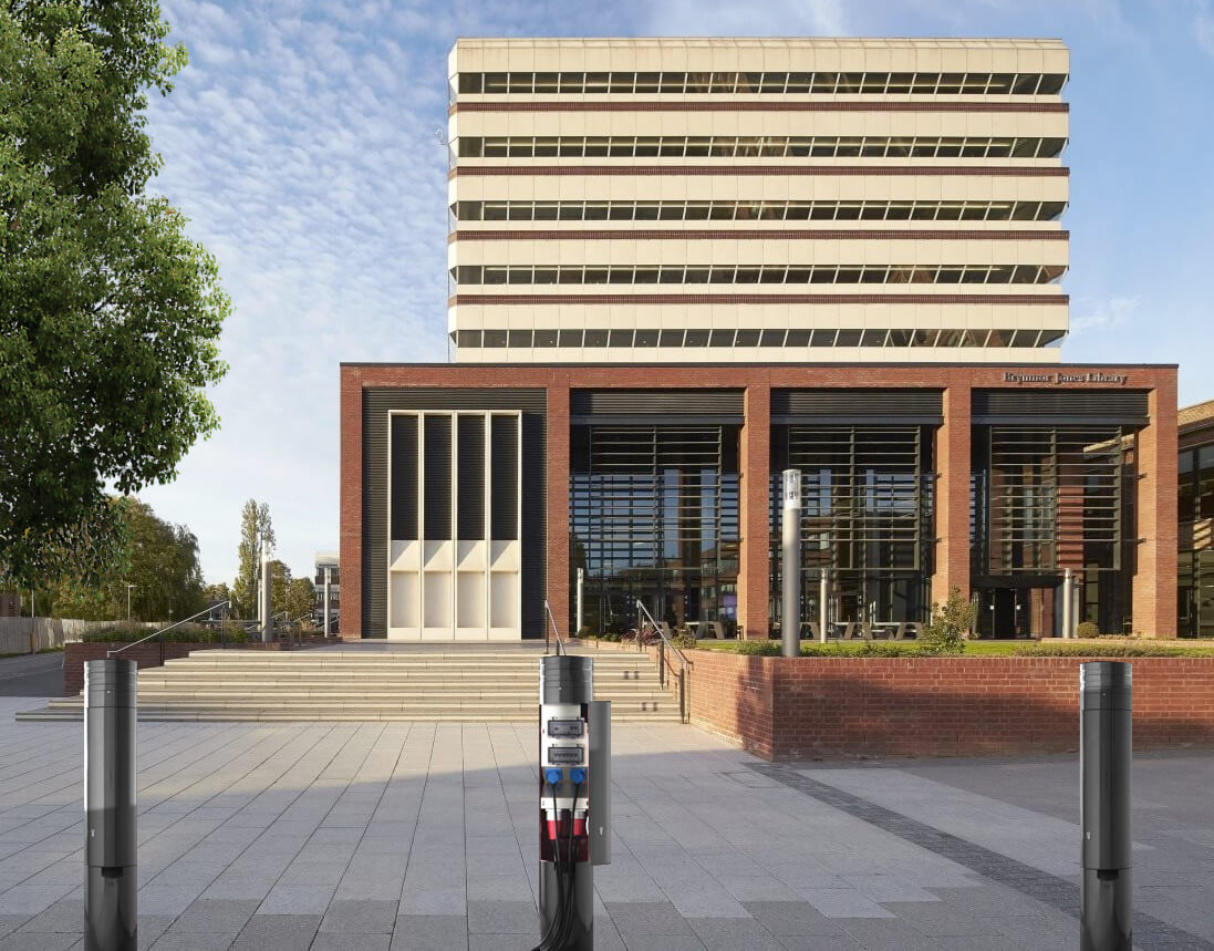 image showing three power bollards outside a university building