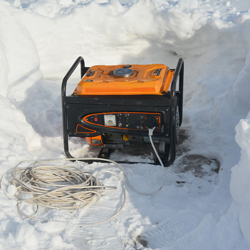 Petrol generator in snow