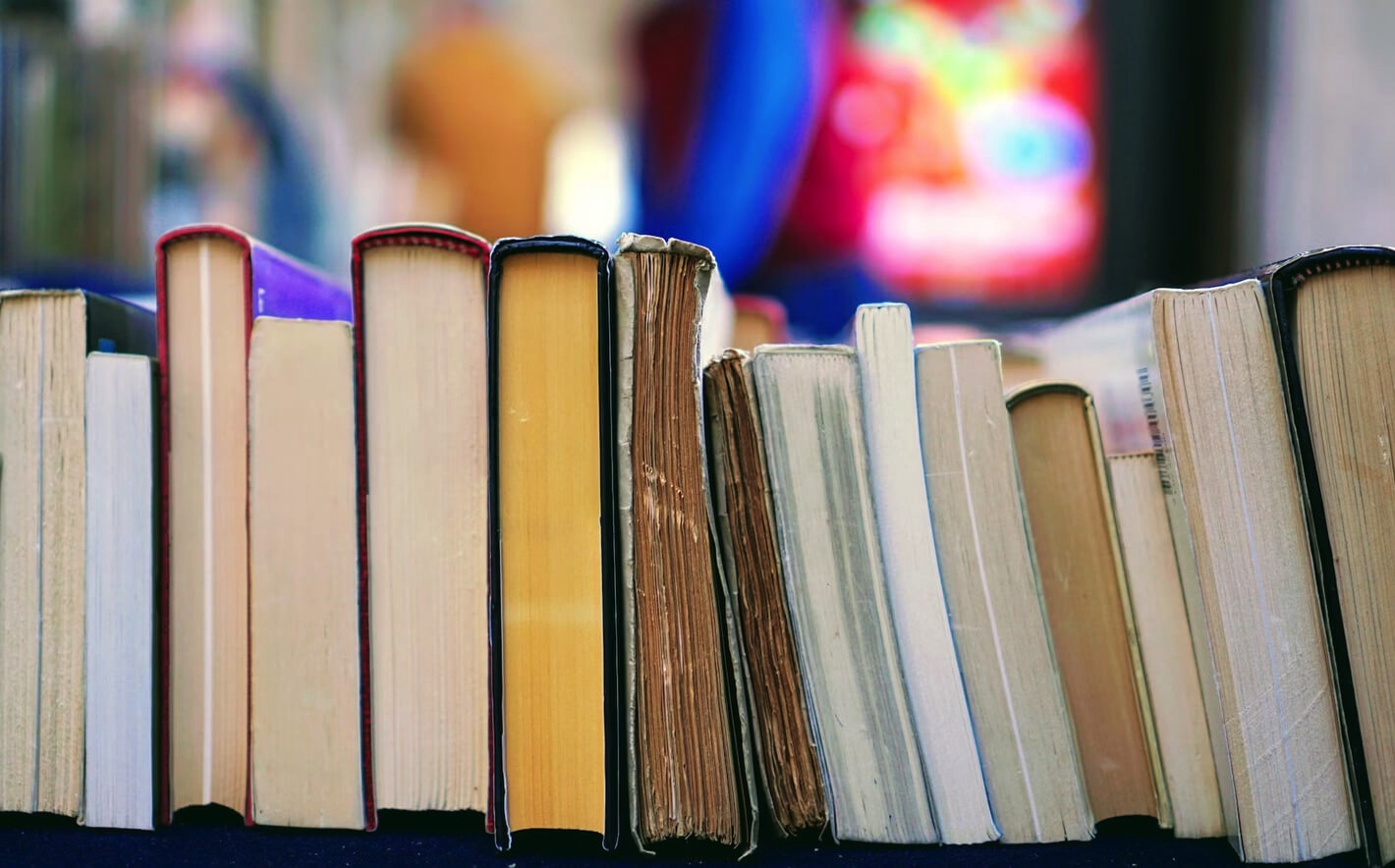 Image of books within a library